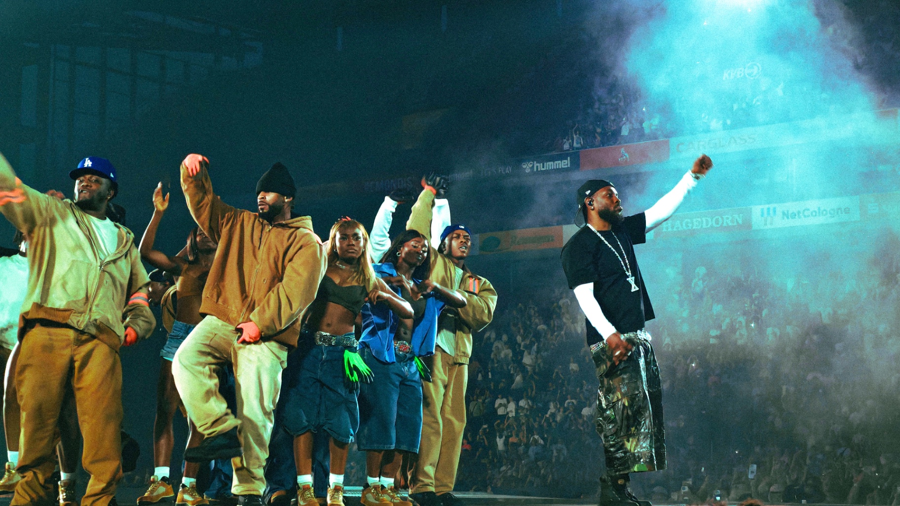 Taiwan Williams performing on stage with his crew